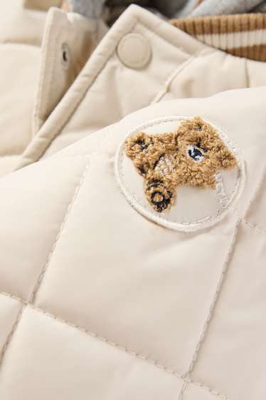 Nadó nen - Osset - jaqueta embuatada amb caputxa per a nadó - beix clar