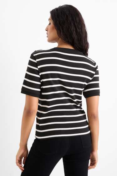 Women - Knitted jumper - short sleeve - striped - black / white