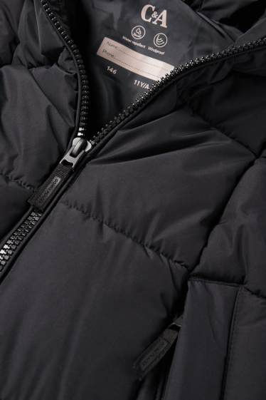 Nena - Armilla embuatada llarga amb caputxa - repel·lent a l’aigua - negre