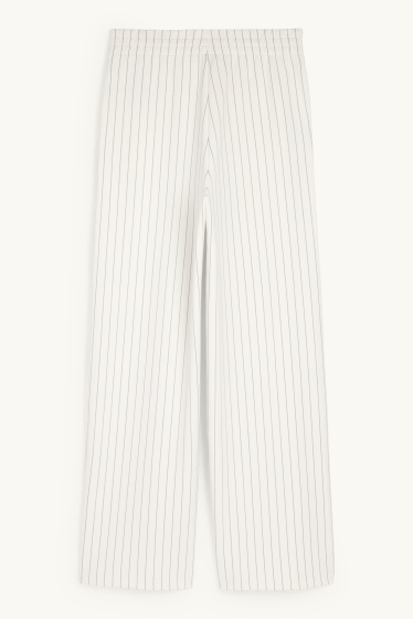 Dames - Broek van jersey - mid waist - straight fit - met strepen - crème wit
