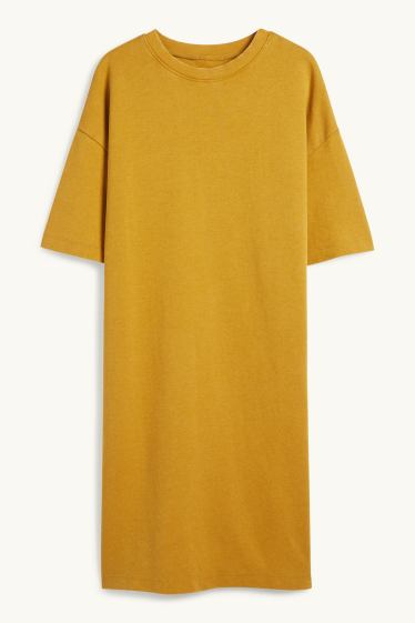 Dames - T-shirt-jurk - mosterdgeel