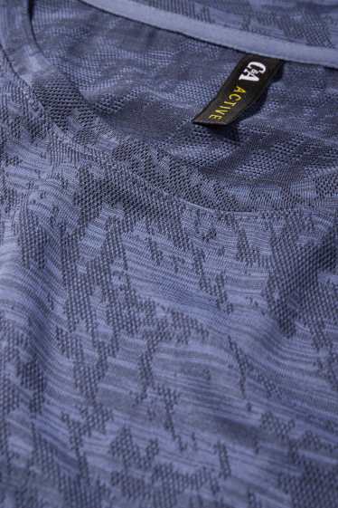 Femmes - Haut de sport - finition texturée - bleu foncé