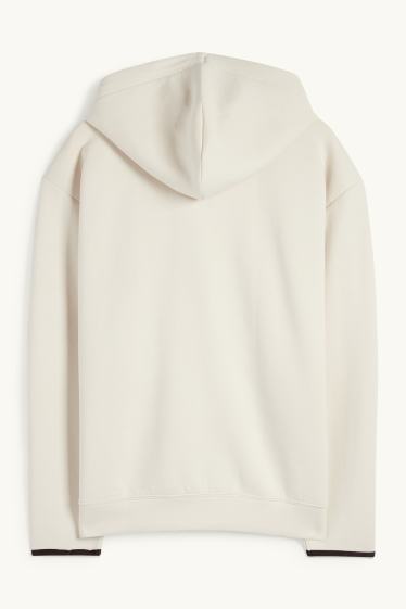 Home - Dessuadora oberta tècnica amb caputxa - blanc trencat