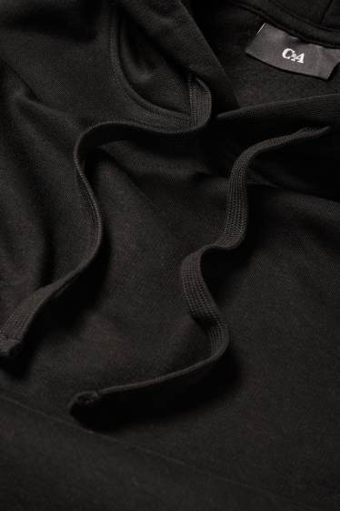 Home - Dessuadora amb caputxa - negre