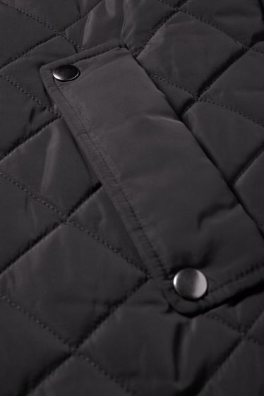 Dona - Abric embuatat - negre