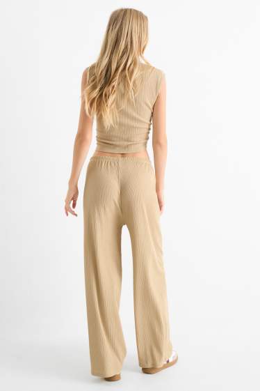 Femmes - Pantalon en jersey - mid waist - wide leg - finition texturée - beige