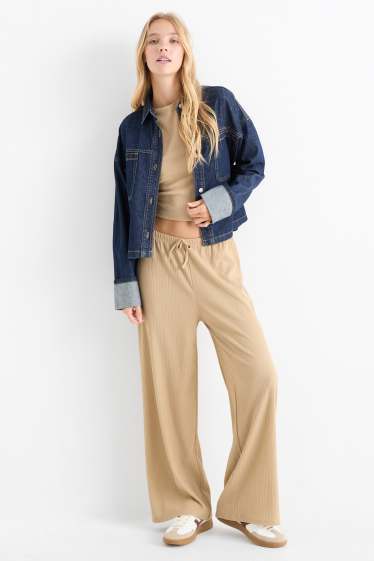 Femmes - Pantalon en jersey - mid waist - wide leg - finition texturée - beige