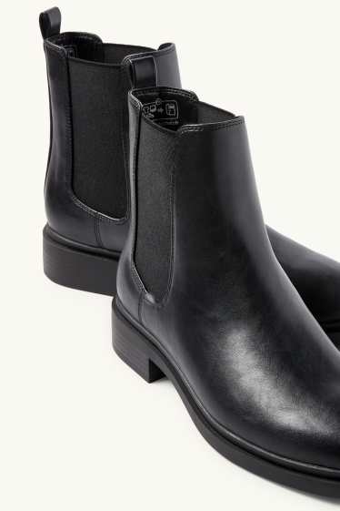 Femmes - Bottines chelsea - matière synthétique - noir