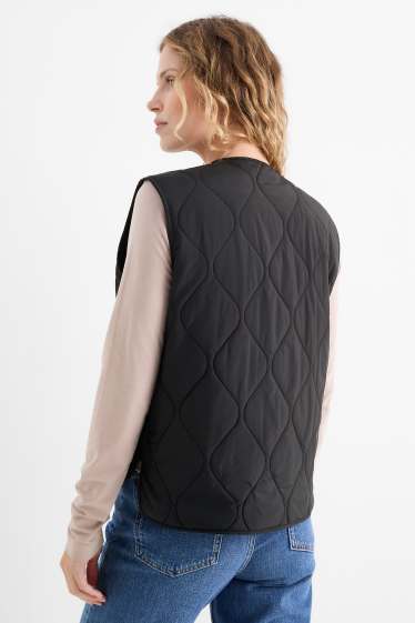 Women - Quilted gilet - black