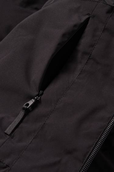 Men - Quilted gilet - water-repellent - black