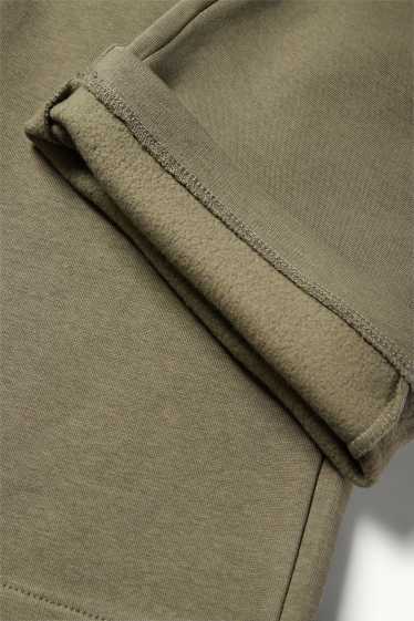Uomo - Pantaloni sportivi - verde