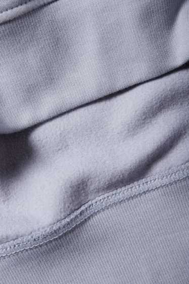 Home - Dessuadora - blau clar