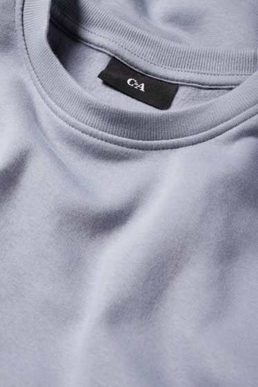 Home - Dessuadora - blau clar