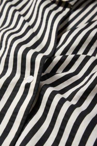 Femmes - Chemisier en lin mélangé à col V - à rayures - noir / blanc