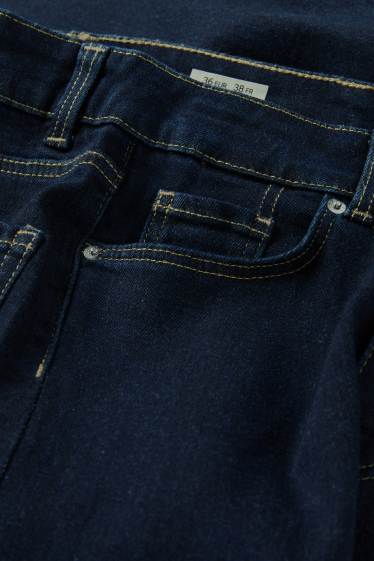 Femmes - Jean à jambe évasée - mid waist - jean bleu foncé