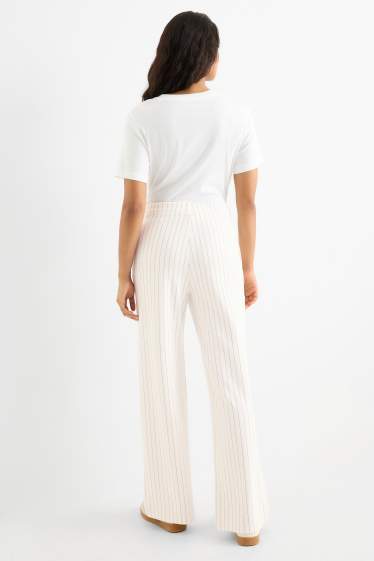 Dames - Broek van jersey - mid waist - straight fit - met strepen - crème wit