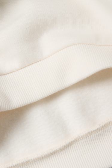 Kinderen: meisjes - Bloem - set - sweatshirt en jersey broek - 2-delig - crème wit