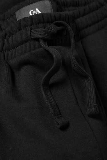 Pánské - Teplákové kalhoty - černá