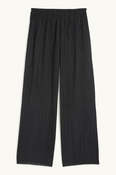 Women - Plissé trousers - high-rise waist - wide leg - black