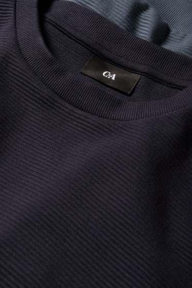 Home - Dessuadora - acanalada - de ratlles - blau fosc