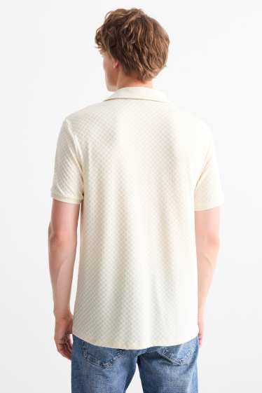 Hommes - Polo - regular fit - finition texturée - blanc crème