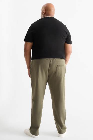 Uomo - Pantaloni sportivi - verde