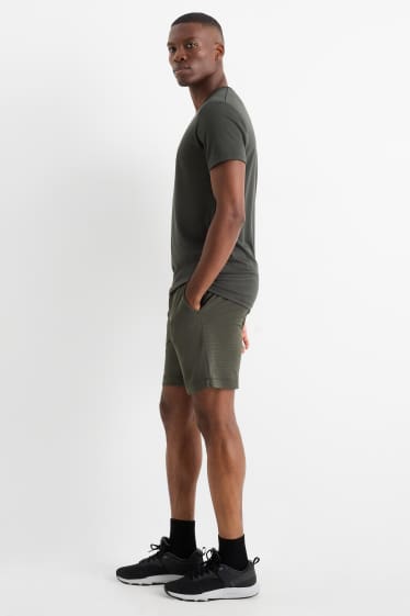Hommes - Short de sport - texturé - vert foncé