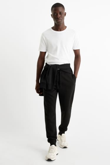 Pánské - Teplákové kalhoty - černá