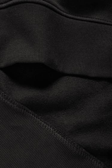 Home - Dessuadora - negre