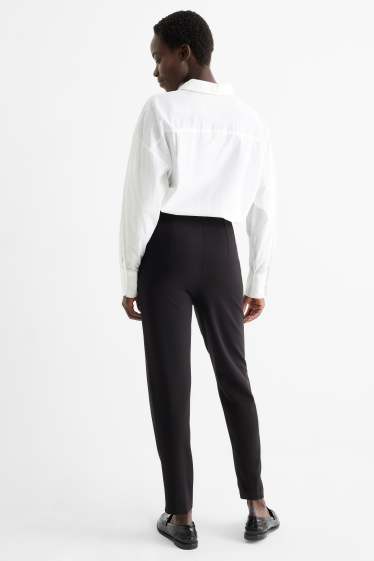 Dona - Pantalons de punt - high waist - slim fit - negre