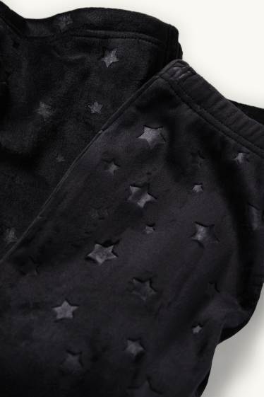 Kinder Mädchen - Sterne - Flared Leggings - schwarz