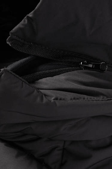 Femei - Jachetă matlasată sport cu glugă - negru