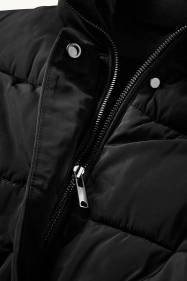 Damen - Steppweste mit Gürtel - schwarz