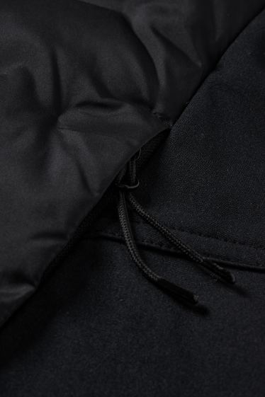 Women - Technical quilted gilet with hood - black