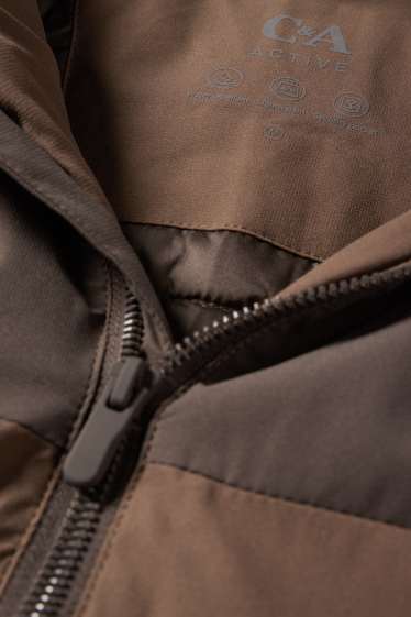 Home - Jaqueta tècnica amb caputxa - folrada - impermeable - marró