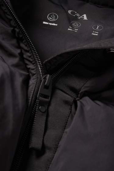 Damen - Steppmantel mit Kapuze - wasserabweisend - schwarz