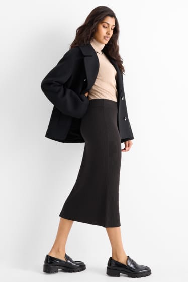 Women - Knitted skirt - ribbed - black