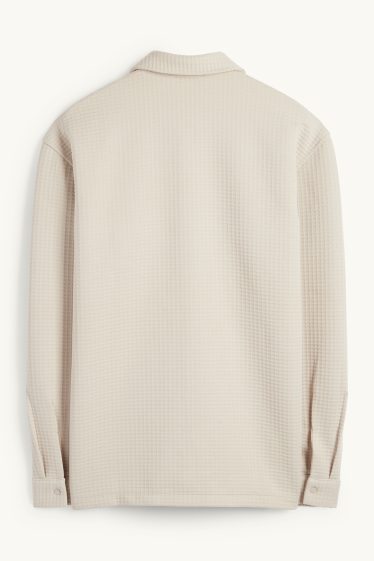 Uomo - Giacca camicia - relaxed fit - collo all'italiana - tessuto tramato - beige