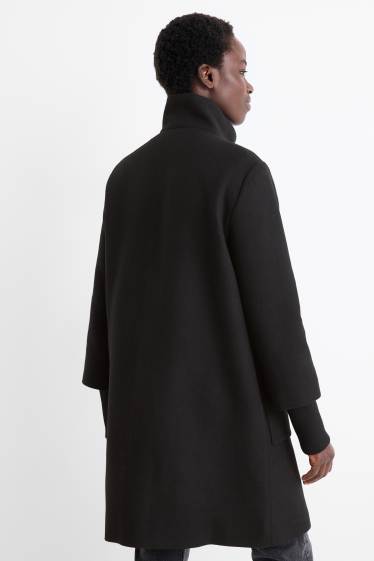 Dona - Abric - negre