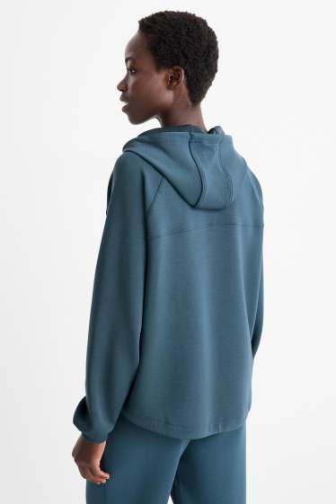 Dona - Dessuadora esportiva amb caputxa - ioga - petroli