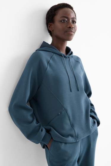 Dona - Dessuadora esportiva amb caputxa - ioga - petroli