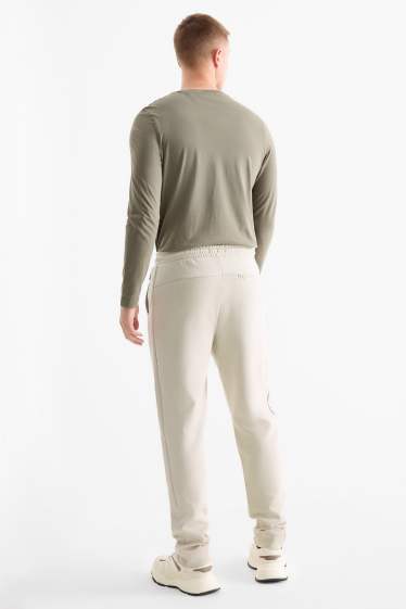 Home - Pantalons de xandall - beix clar