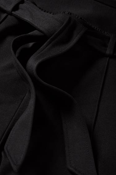 Women - Jersey trousers - mid-rise waist - flared fit - black