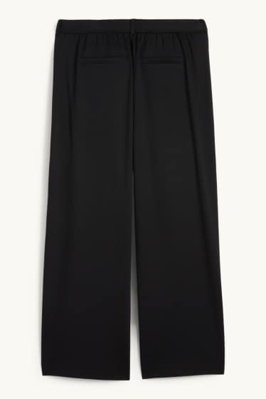 Women - Jersey trousers - mid-rise waist - flared fit - black