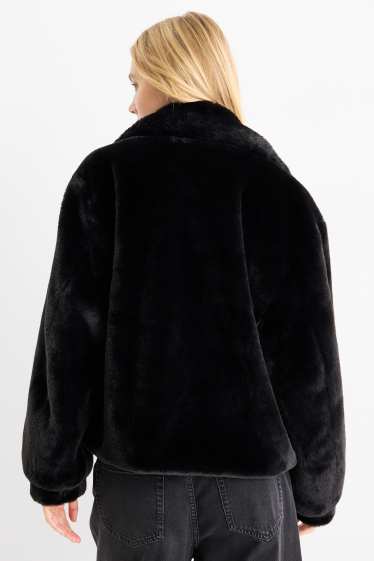 Femmes - Veste en imitation fourrure - noir