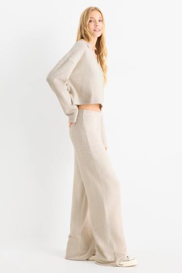 Women - Knitted trousers - mid-rise waist - wide leg - ribbed - light beige