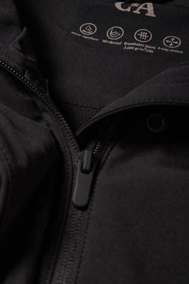 Donna - Giacca soft shell con cappuccio - idrorepellente - 4 Way Stretch - nero