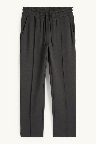 Dames - Jersey broek - mid waist - tapered fit - donkergrijs
