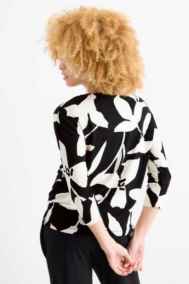 Dames - Longsleeve - regular fit - gebloemd - zwart / wit