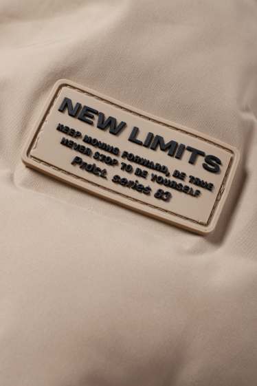 Kinder Jungen - Steppjacke mit Kapuze - wasserabweisend - beige